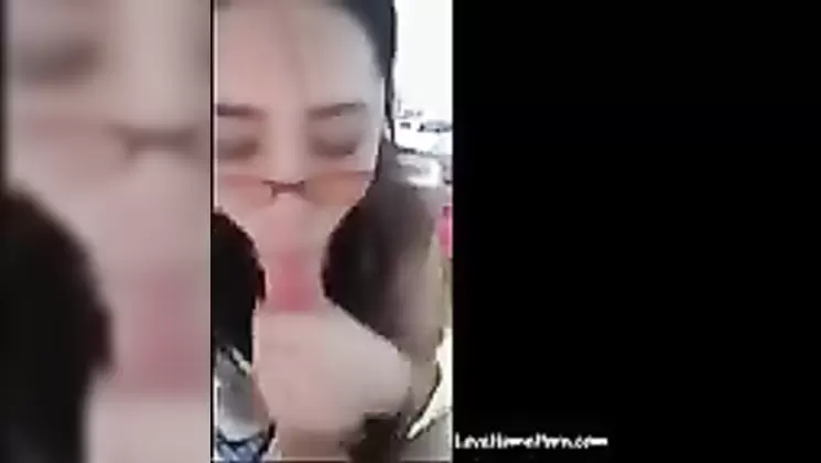 Geeky Asian girlfriend sucks a big dick and gets a facial