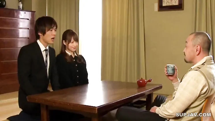 Petite Japanese babe with small tits gives a hot BJ to a lucky dude