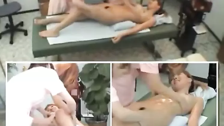 Spy cam shows a naked Japanese girl receiving a massage